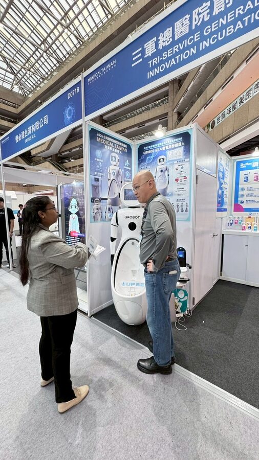 A medical-device distributor from India in discussion with the founder