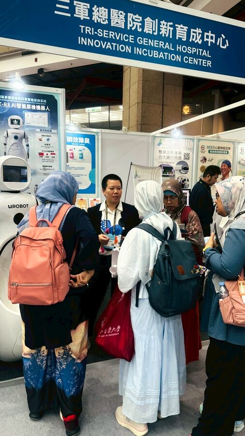 Our Indonesian colleague talking with a visiting group of officials from Indonesian healthcare agencies